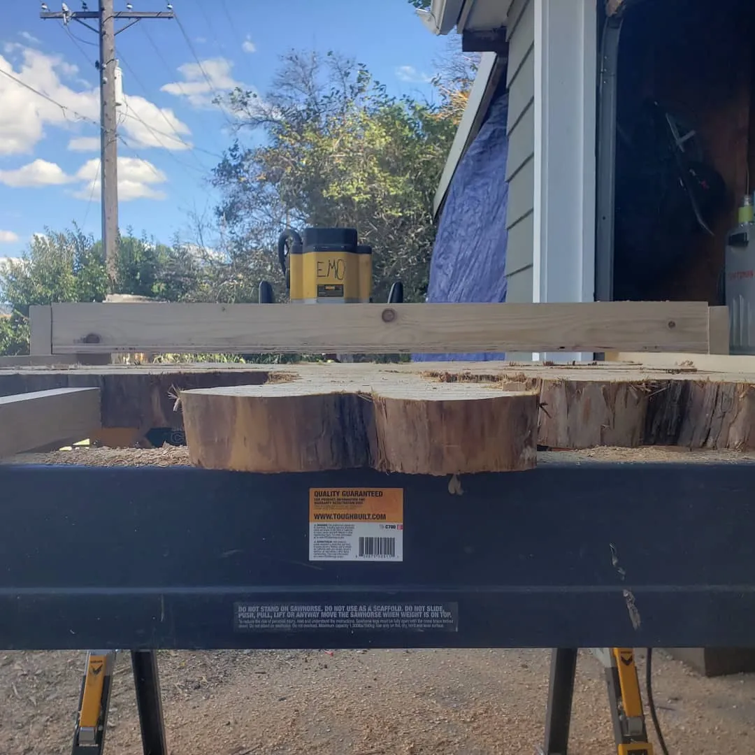 Custom starburst end-grain table top showing radial wood pattern design