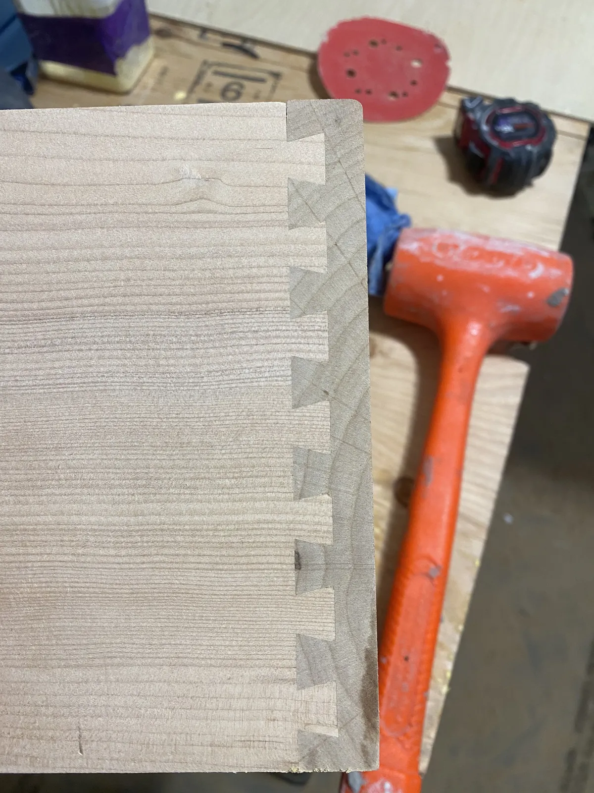 Finish carpentry with baseboard trim and wall transition detail