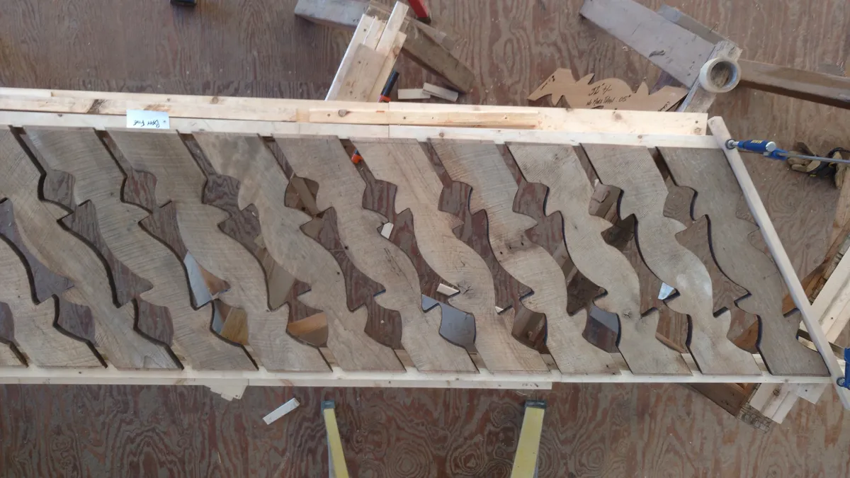 Close-up of custom porch corbel bracket at post-to-beam connection