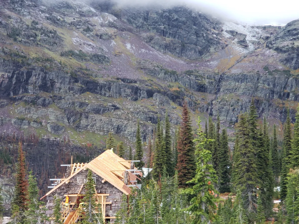 Post-and-beam timber frame connection with structural hardware